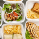 styrofoam takeout containers on table